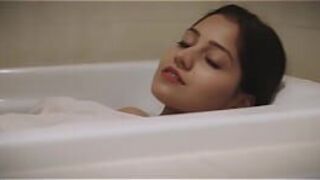 Desi Girl wearing saree seduces in bathtub - porn video