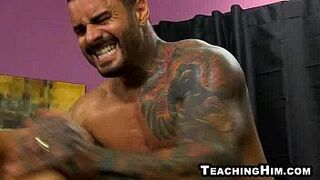 Twink getting fucked anally by a tattooed stud - porn video